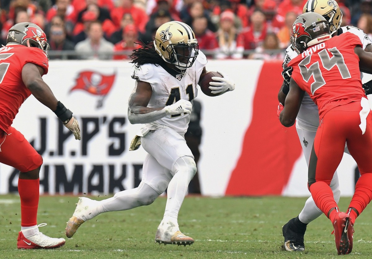 Nov 17, 2019; Tampa, FL, USA; New Orleans Saints running back Alvin Kamara (41) runs the ball against the Tampa Bay Buccaneers in the first half at Raymond James Stadium. Mandatory Credit: Jonathan Dyer-USA TODAY Sports