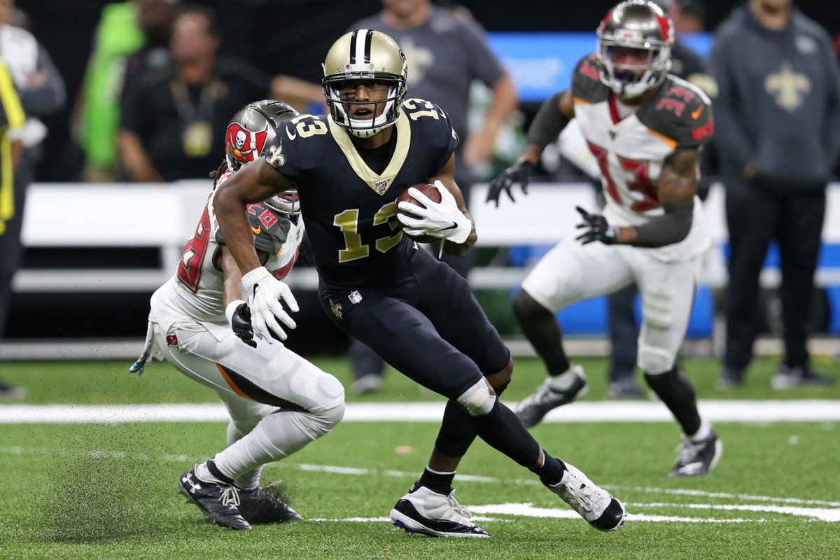 Oct 6, 2019; New Orleans, LA, USA; New Orleans Saints wide receiver Michael Thomas (13) makes a catch against Tampa Bay Buccaneers cornerback Vernon III Hargreaves (28) in the second quarter at the Mercedes-Benz Superdome. Mandatory Credit: Chuck Cook-USA TODAY 