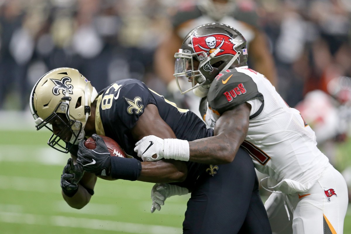 Oct 6, 2019; New Orleans, LA, USA; New Orleans Saints tight end Jared Cook (87) makes a touchdown catch against Tampa Bay Buccaneers free safety Jordan Whitehead (31) in the second quarter at the Mercedes-Benz Superdome. Mandatory Credit: Chuck Cook-USA TODAY 