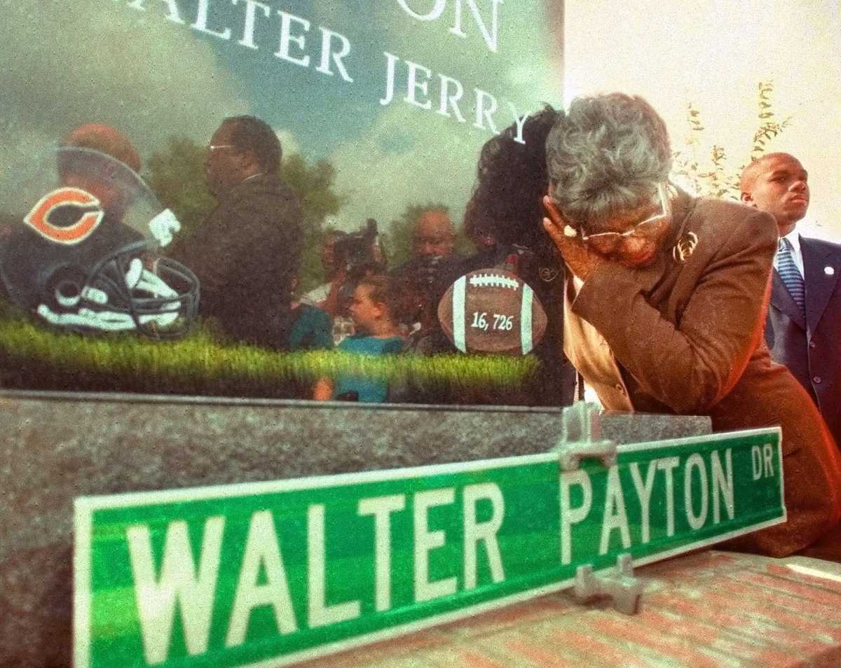 Alyne Payton, mother of former Jackson State and Bears running back Walter Payton, clutches a monument to her late son that was unveiled Nov. 3, 2000, at a ceremony dedicating the Walter Payton Complex on the JSU campus.
