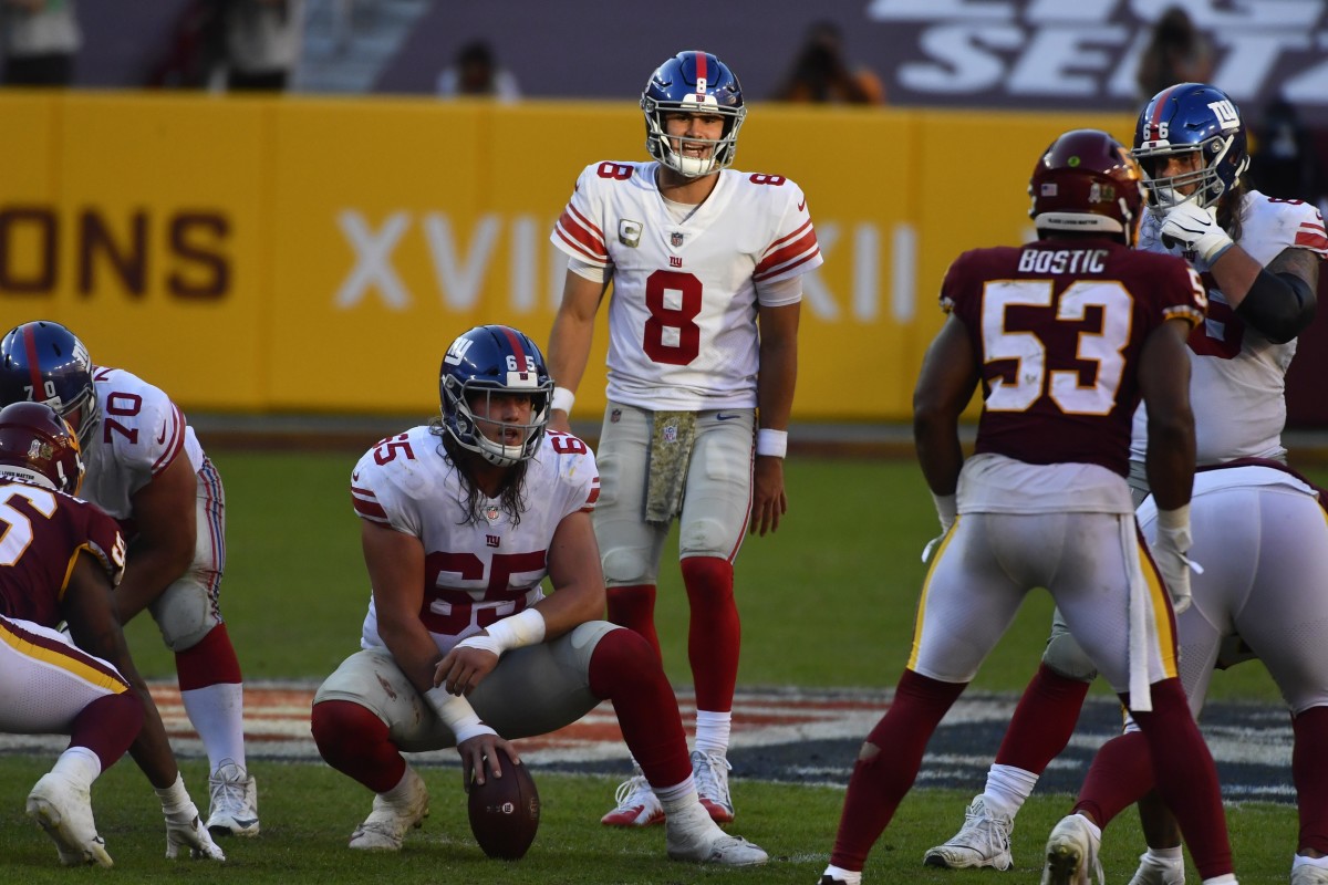 Nov 8, 2020; Landover, Maryland, USA; New York Giants quarterback Daniel Jones (8) at the line of scrimmage against the Washington Football Team during the fourth quarter at FedExField.