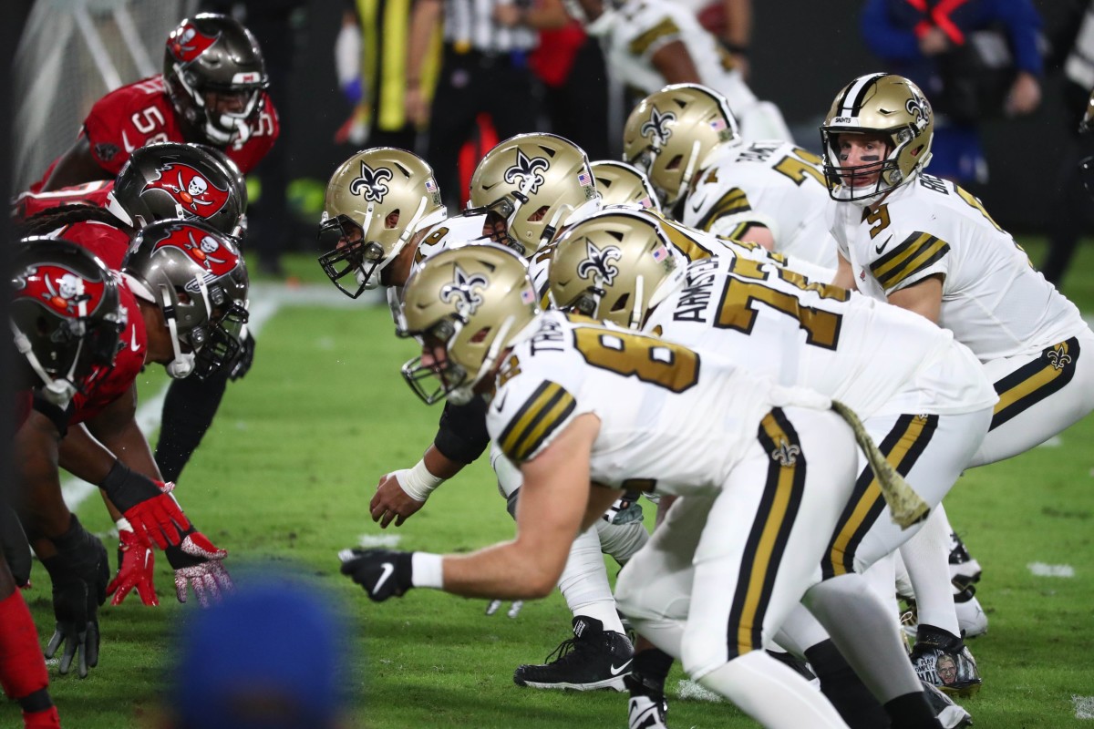 Nov 8, 2020; Tampa, Florida, USA; New Orleans Saints quarterback Drew Brees (9) under center against the Tampa Bay Buccaneers in the first quarter of a NFL game at Raymond James Stadium. Mandatory Credit: Kim Klement-USA TODAY Sports