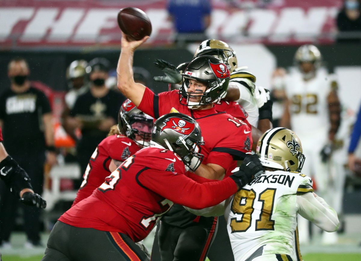 Nov 8, 2020; Tampa, Florida, USA;Tampa Bay Buccaneers quarterback Tom Brady (12) throws the ball against the New Orleans Saints during the first half at Raymond James Stadium. Mandatory Credit: Kim Klement-USA TODAY 