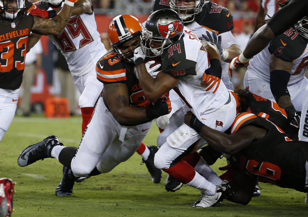 Former Cleveland defensive end Chris Hughes (93) makes a tackle against the Tampa Bay in the 2016 preseason. Hughes was one of few bright spots the Browns had among the players they selected in the 2012 NFL Draft.