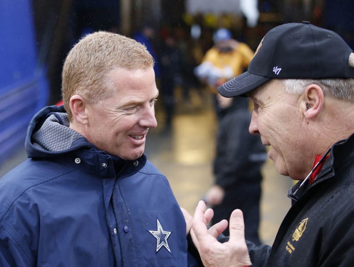 Former Browns guard Joe DeLamielleure (right) talks to Cowboys head coach Jason Garrett before a 2015 game in Buffalo. DeLamielleure had five strong seasons in Cleveland after a lengthy tenure in Buffalo.