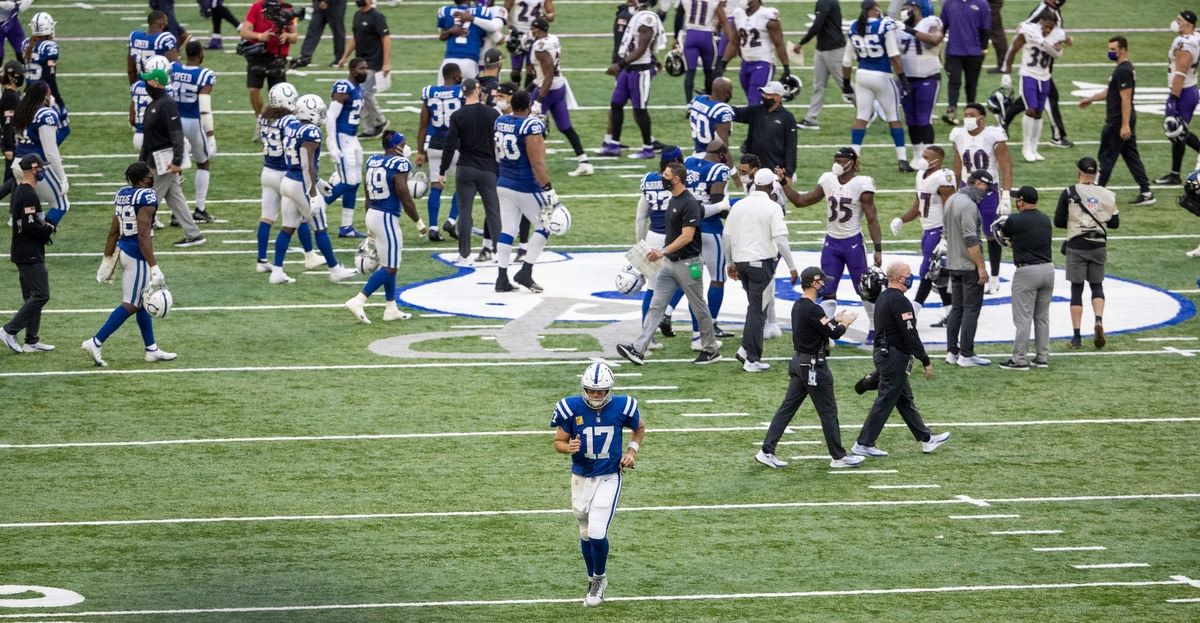 Quarterback Philip Rivers (17) jogs off the Lucas Oil Stadium field after the Indianapolis Colts failed to score a point in the second half of Sunday's 24-10 home loss to the Baltimore Ravens.
