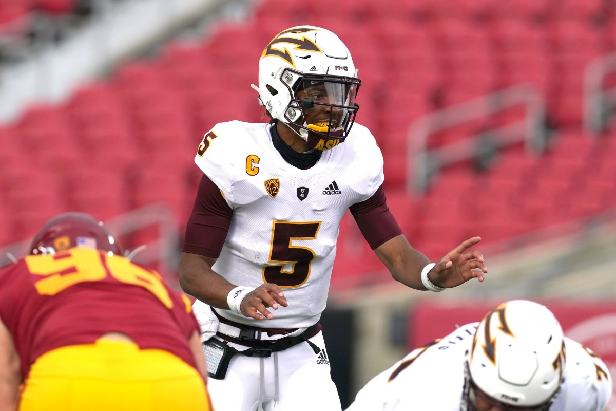 Nov 7, 2020; Los Angeles CA, USA; Arizona State Sun Devils quarterback Jayden Daniels (5) prepares to take the snap in the first quarter against the Southern California Trojans at the Los Angeles Memorial Coliseum. USC defeated Arizona State 28-27.