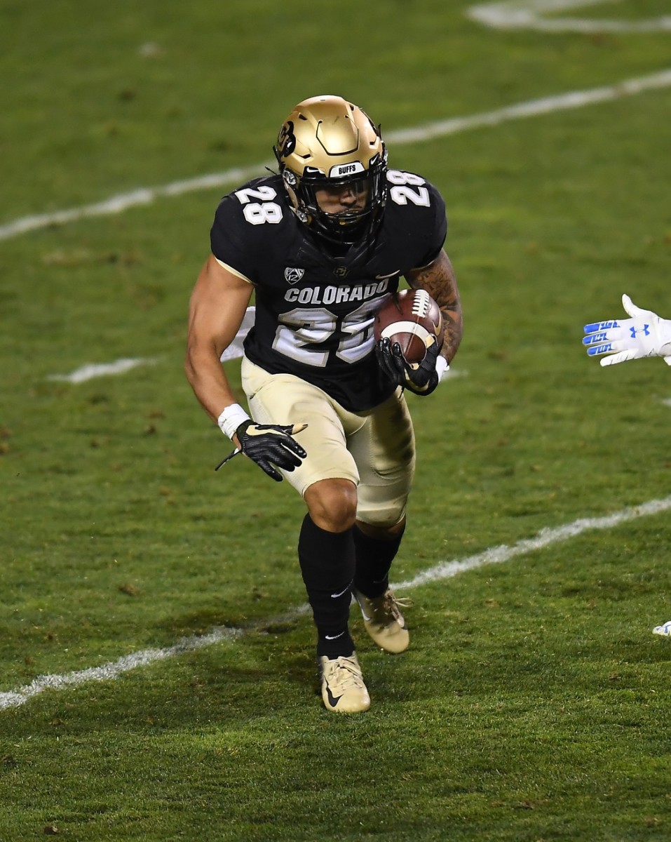 Nov 7, 2020; Boulder, Colorado, USA; Colorado Buffaloes running back Jarek Broussard (23) carries the ball in the fourth quarter against the UCLA Bruins at Folsom Field.