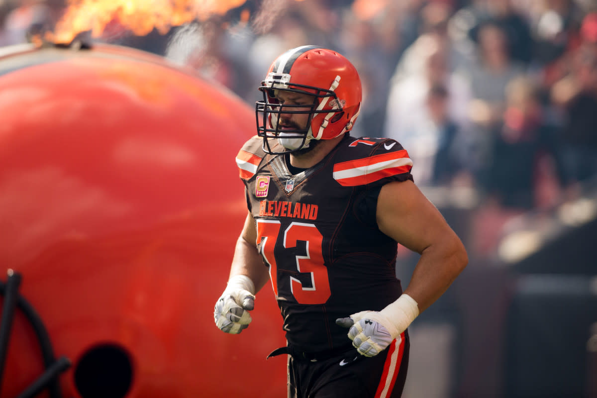 Browns offensive tackle Joe Thomas jogs onto the field for a 2016 game against the Patriots. Thomas is one of the greatest Browns players of all time.
