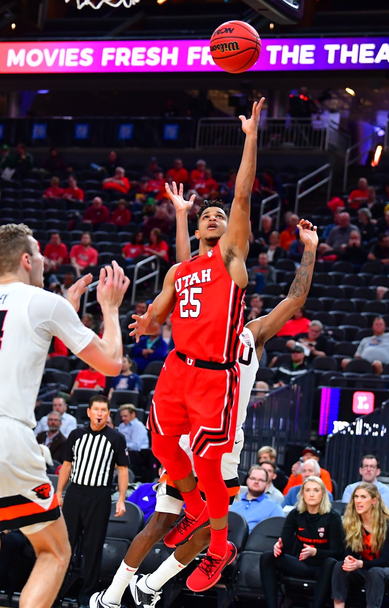 Mar 11, 2020; Las Vegas, Nevada, USA; Utah Utes guard Alfonso Plummer (25) shoots during the first half against the Oregon State Beavers at Mobile Arena.