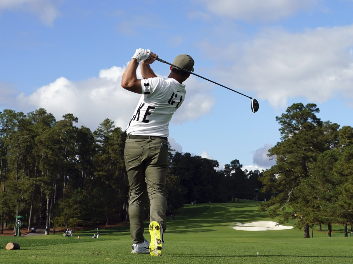 Paul Casey plays his shot from the eighth tee during the first round of The Masters golf tournament at Augusta National GC.