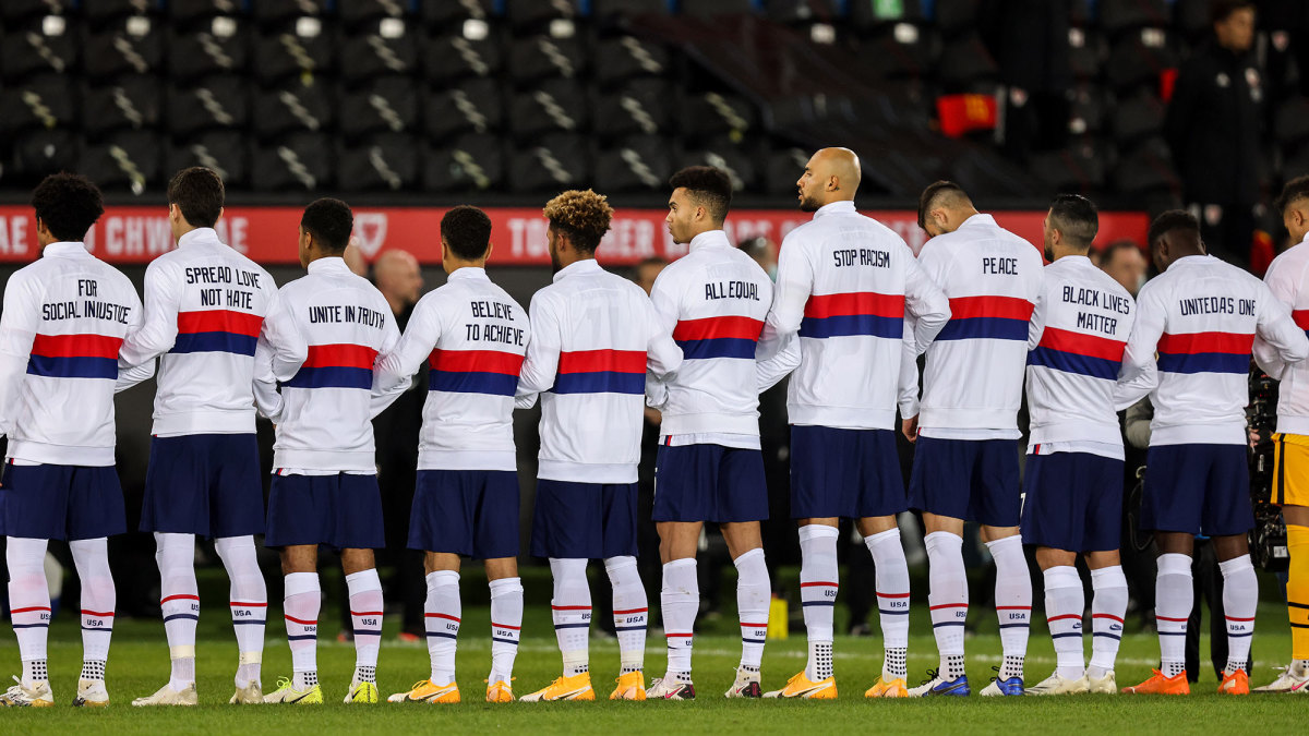 The USMNT wear jackets with messages for unity, awareness