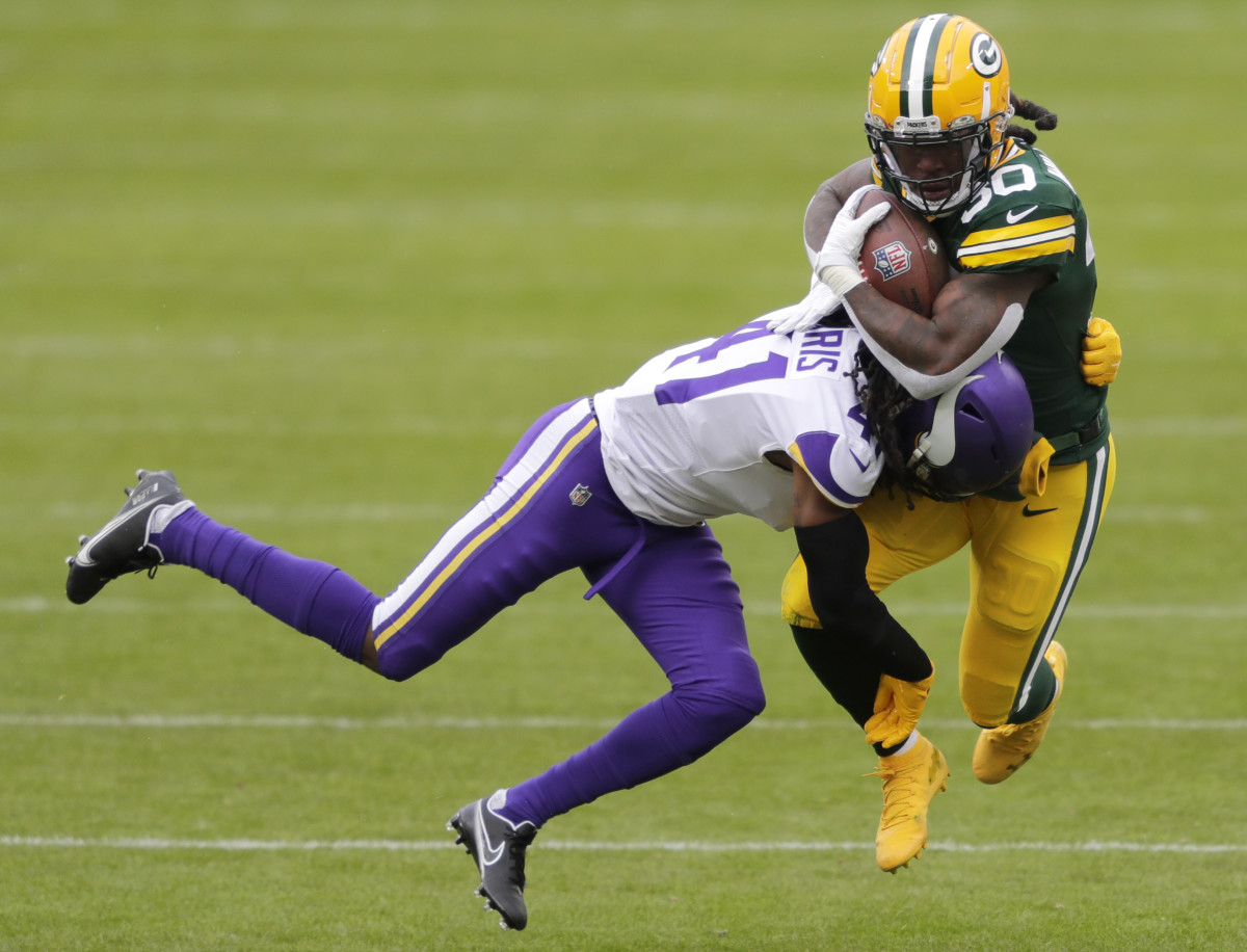 anthony-harris-tackling-jamaal-williams