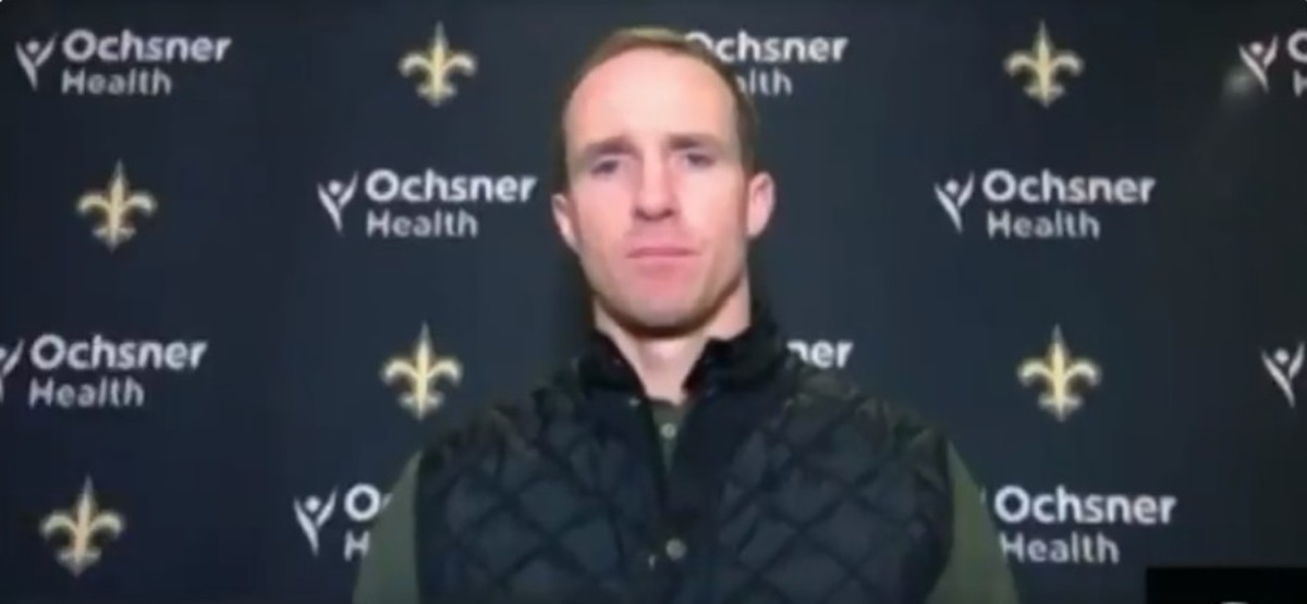 Drew Brees talking about his injury with the media.