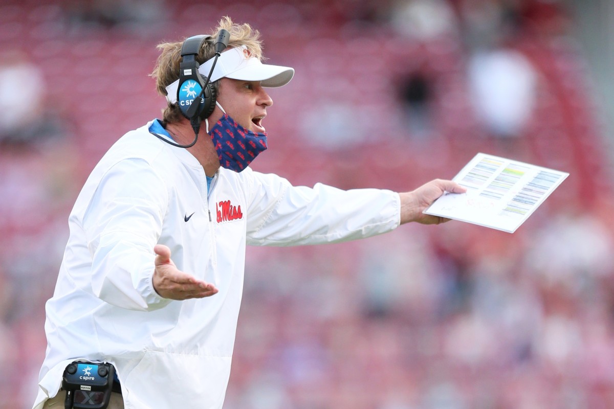 Ole Miss Rebels head coach Lane Kiffin reacts to a call during the fourth quarter against the Arkansas Razorbacks at Donald W. Reynolds Razorback Stadium. Arkansa won 33-21. Mandatory Credit: Nelson Chenault-USA TODAY Sports