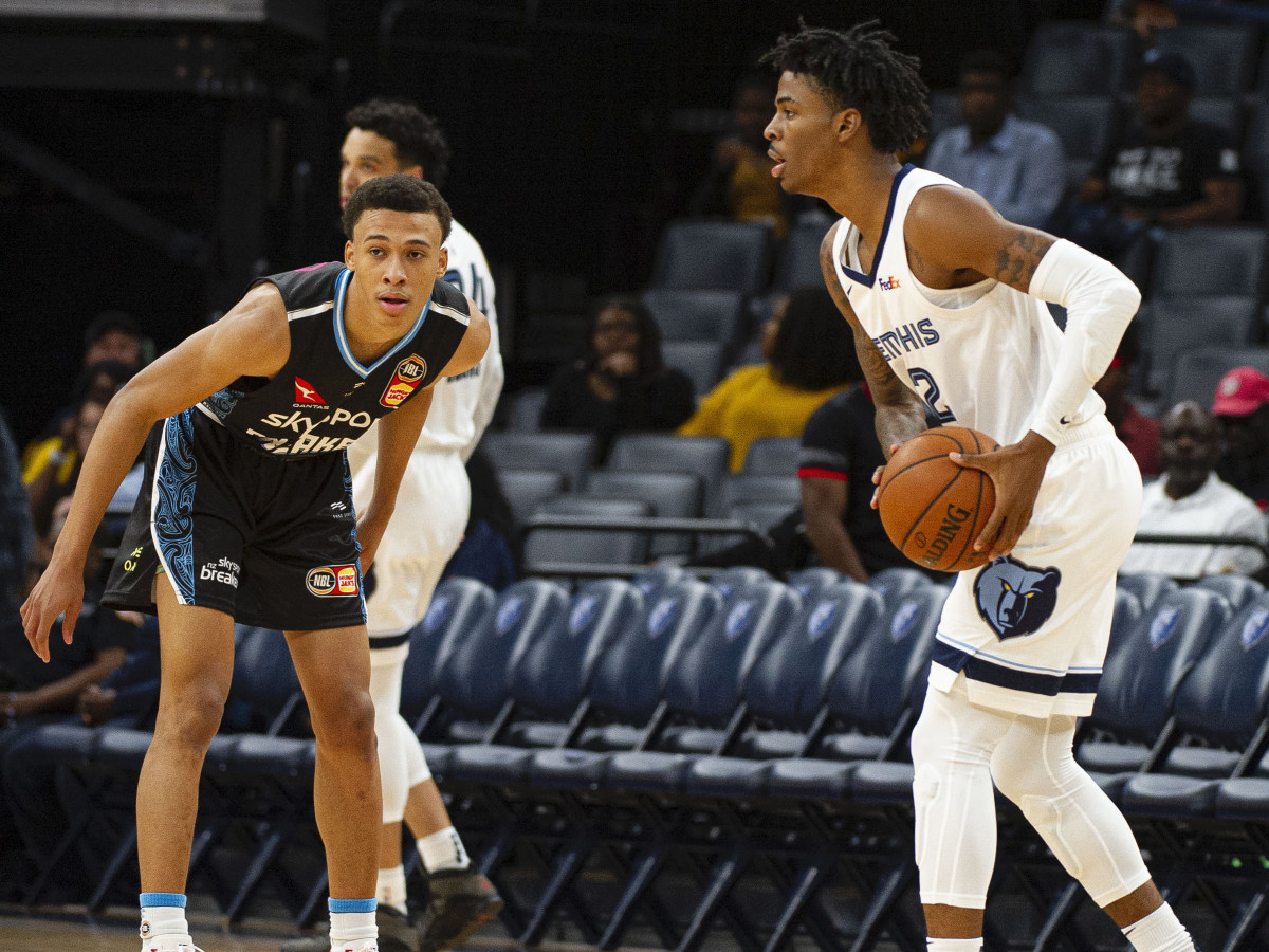 Memphis Grizzlies guard Ja Morant handles the ball against New Zealand Breakers guard R.J. Hampton during an October 2019 exhibition.
