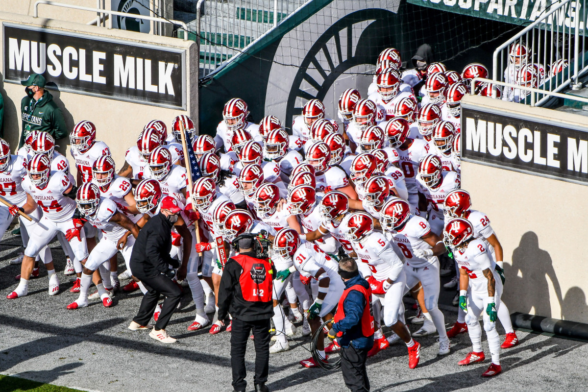Indiana football runs out of the tunnel at Michigan State