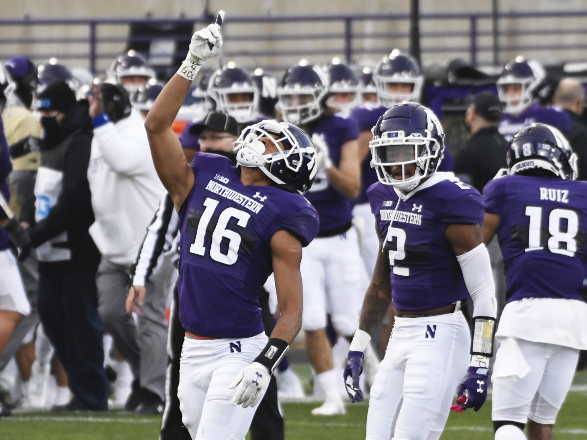 Northwestern Wildcats defensive back Brandon Joseph (16) gestures after intercepting against the Wisconsin Badgers during the first half at Ryan Field