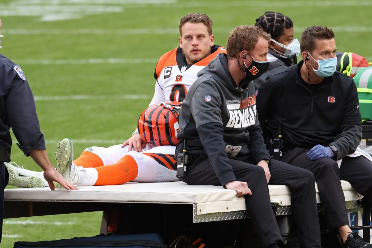 Nov 22, 2020; Landover, Maryland, USA; Cincinnati Bengals quarterback Joe Burrow (9) is carted off the field after injuring his left knee against the Washington Football Team in the third quarter at FedExField.