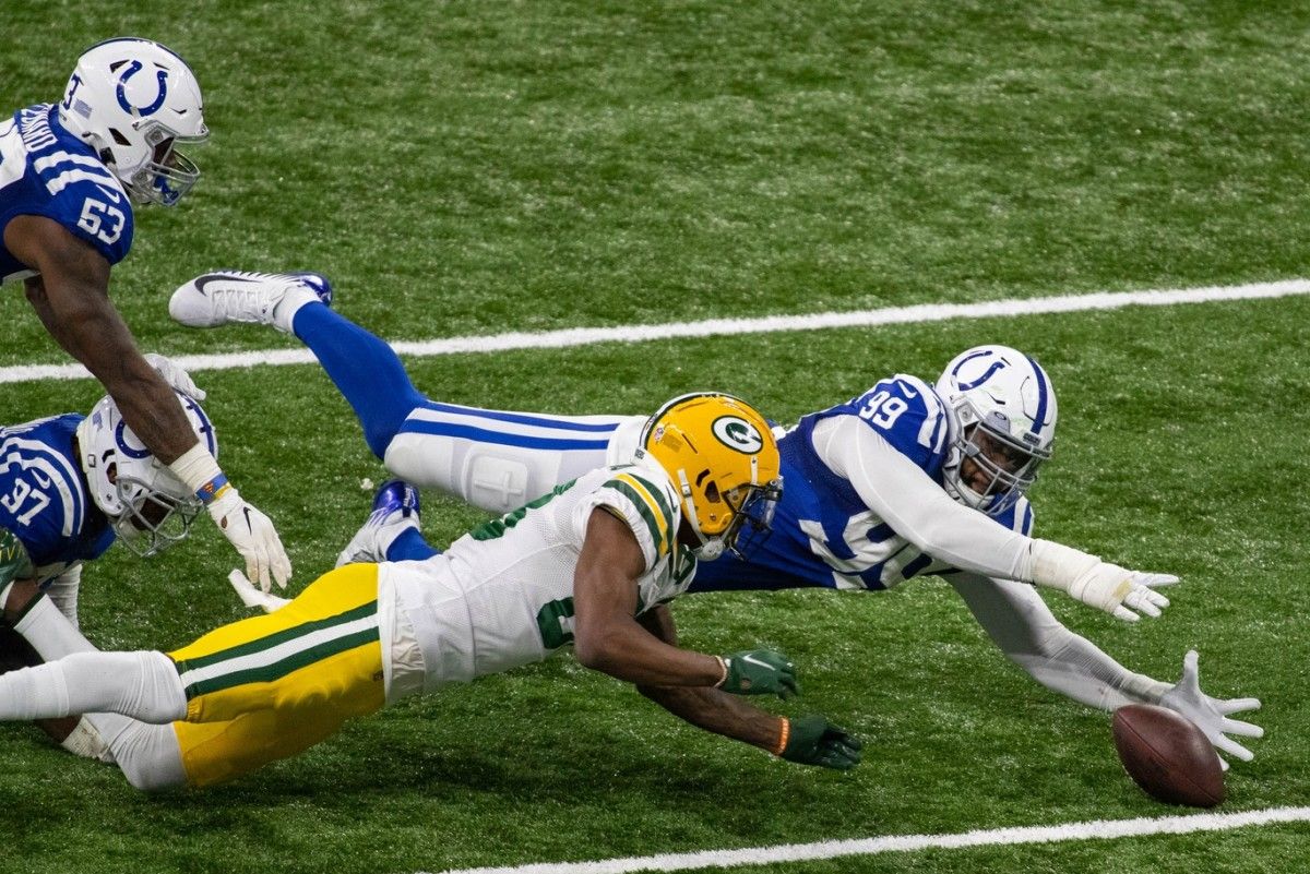 Indianapolis Colts defensive tackle DeForest Buckner falls on a fumble in overtime to set up a game-winning field goal in a 34-31 home win Sunday over the Green Bay Packers.
