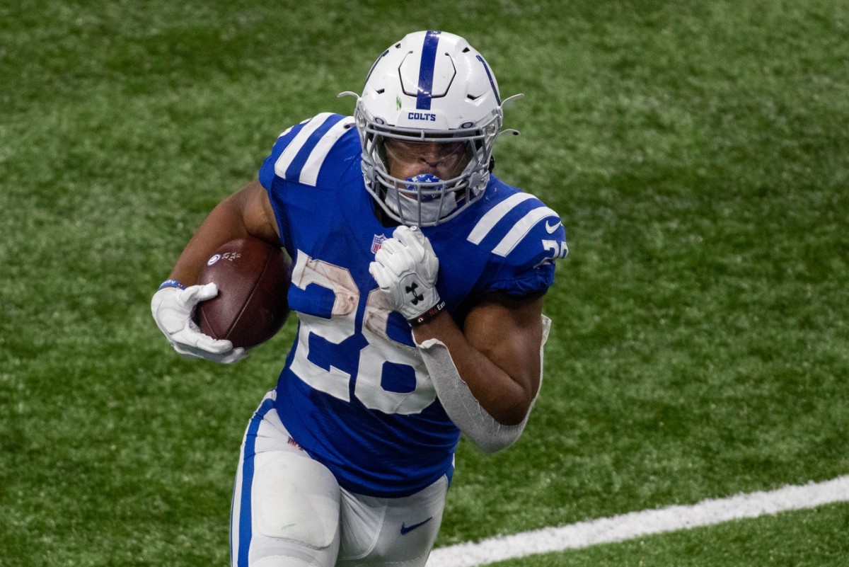 Indianapolis Colts rookie running back Jonathan Taylor looks for space in Sunday's overtime home win over the Green Bay Packers.