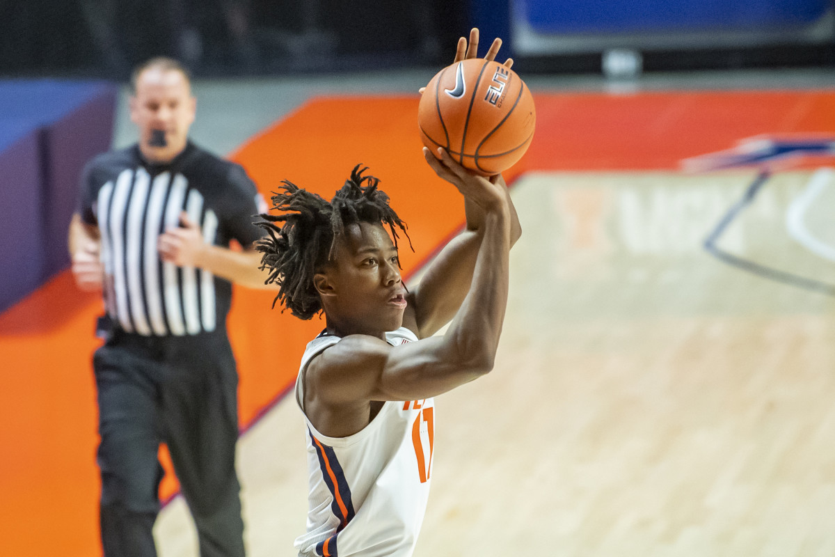 Illinois Fighting Illini guard Ayo Dosunmu (11) hits a three point shot during the first half against the North Carolina A&T Aggies at the State Farm Center.