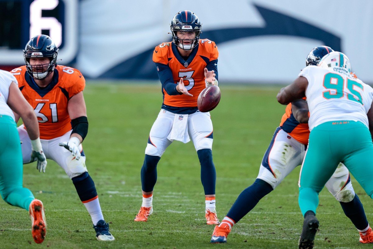 Nov 22, 2020; Denver, Colorado, USA; Denver Broncos quarterback Drew Lock (3) takes a snap in the second quarter against the Miami Dolphins at Empower Field at Mile High. Mandatory Credit: Isaiah J. Downing-USA TODAY 