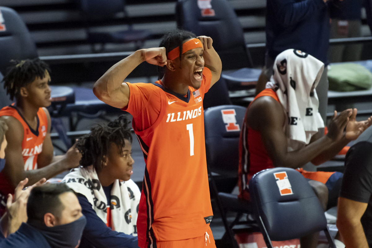 Illinois Fighting Illini guard Trent Frazier (1) celebrates after his teammates score during the second half against the Chicago State Cougars at the State Farm Center.