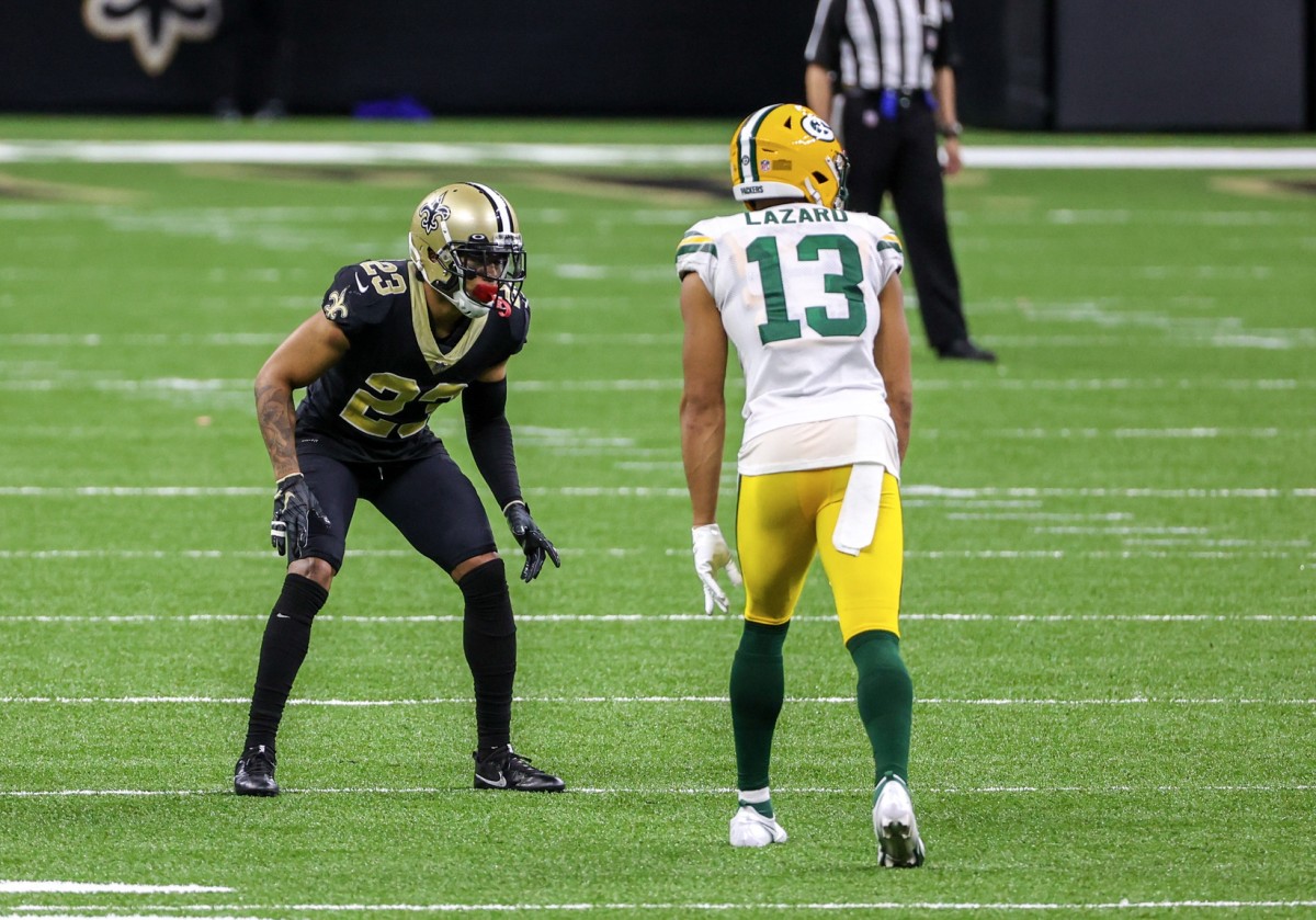Sep 27, 2020; New Orleans, Louisiana, USA; New Orleans Saints cornerback Marshon Lattimore (23) against Green Bay Packers wide receiver Allen Lazard (13) during the second half at the Mercedes-Benz Superdome. Mandatory Credit: Derick E. Hingle-USA TODAY 