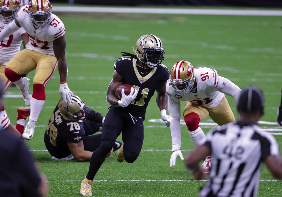 Nov 15, 2020; New Orleans, Louisiana, USA; New Orleans Saints running back Alvin Kamara (41) runs against the San Francisco 49ers during the second quarter at the Mercedes-Benz Superdome. Mandatory Credit: Derick E. Hingle-USA TODAY Sports