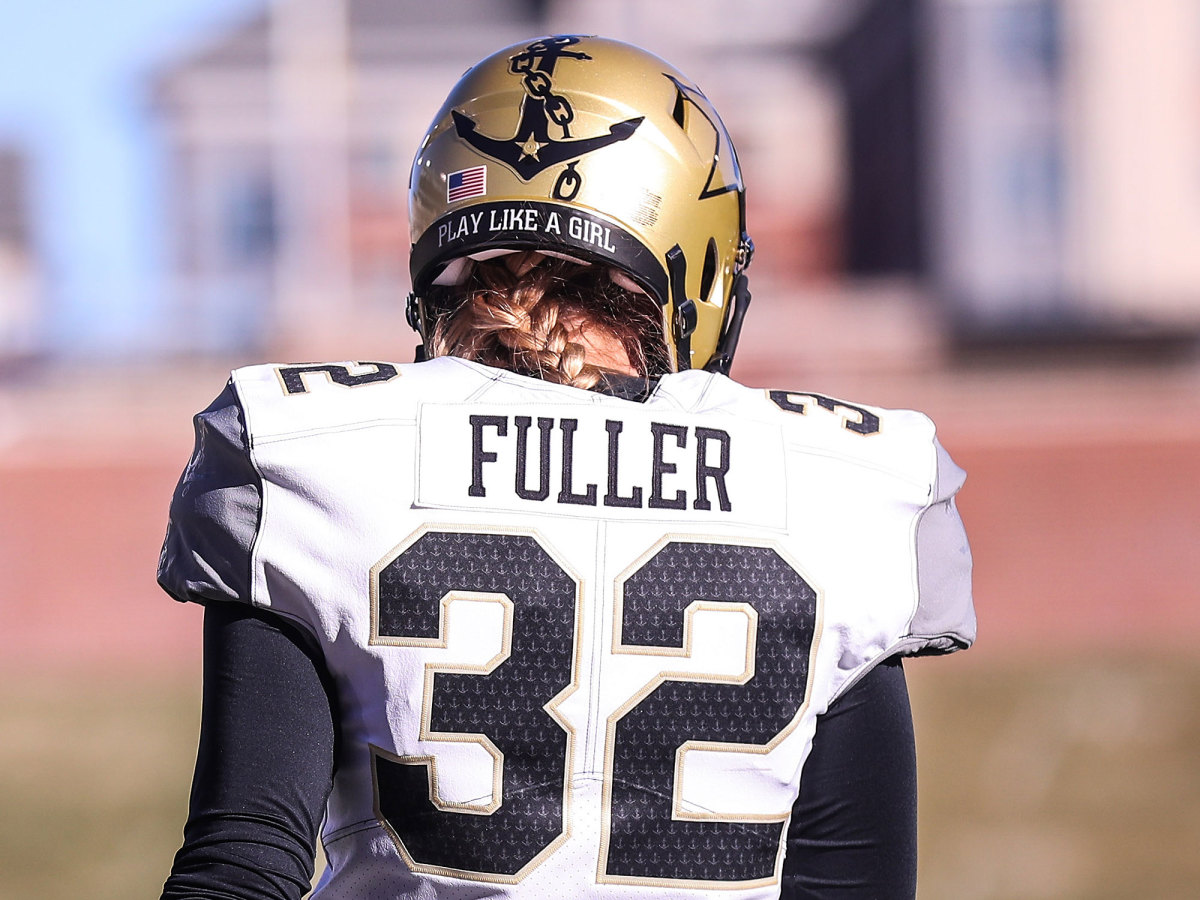 A view of Sarah Fuller's helmet with a "Play Like a Girl" sticker.