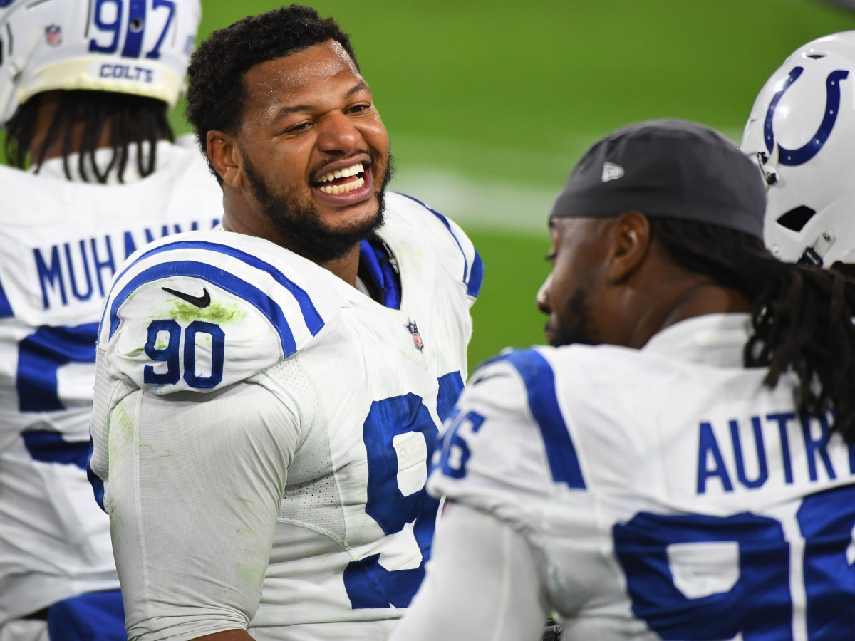 Defensive tackle Grover Stewart reacts to teammate Denico Autry during an Indianapolis Colts' road win over the Tennessee Titans.