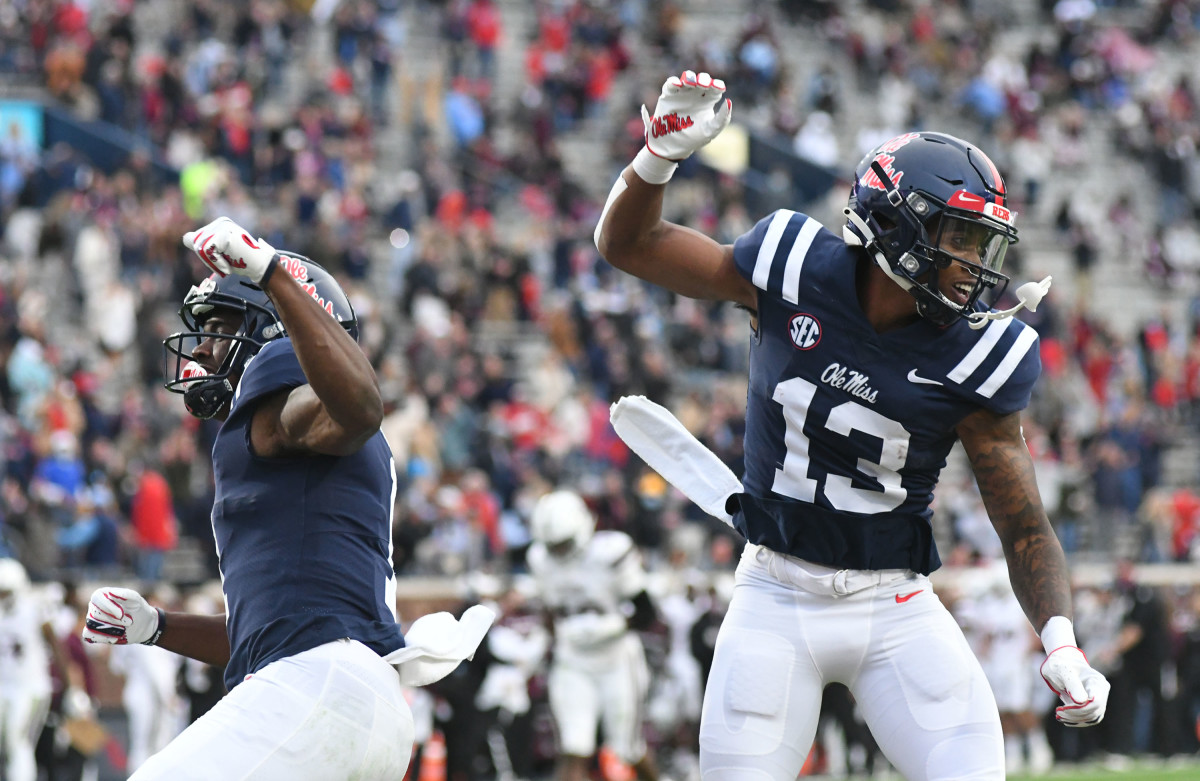 Mississippi wide receiver Braylon Sanders (13) and Mississippi wide receiver Jonathan Mingo (1) celebrate a touchdown against Mississippi State Bulldogs at Vaunt-Hemingway Stadium in Oxford, Miss. on Saturday, Nov. 28, 2020.  (Bruce Newman)