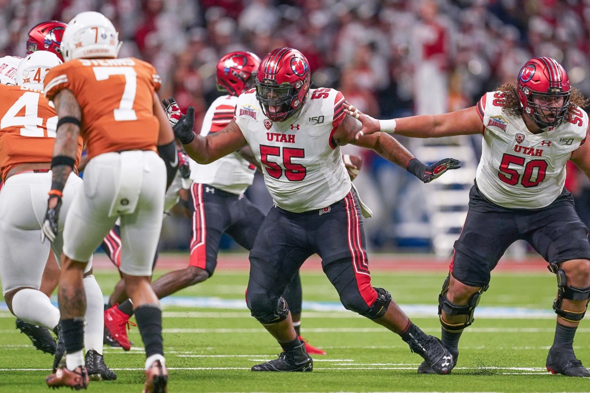 Dec 31, 2019; San Antonio, Texas, USA; Utah Utes offensive lineman Nick Ford (55) looks to block in the first half against the Texas Longhorns at the Alamodome.