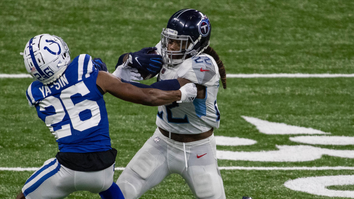 Derrick Henry stiff-arms Rock Ya-Sin during Week 12 win over Colts