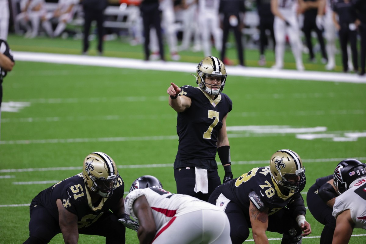 Nov 22, 2020; New Orleans, Louisiana, USA; New Orleans Saints quarterback Taysom Hill (7) at the line against the Atlanta Falcons during the second half at the Mercedes-Benz Superdome. Mandatory Credit: Derick E. Hingle-USA TODAY 
