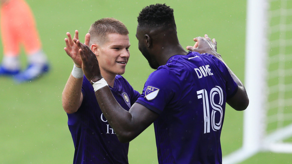 Orlando City's Chris Mueller and Daryl Dike