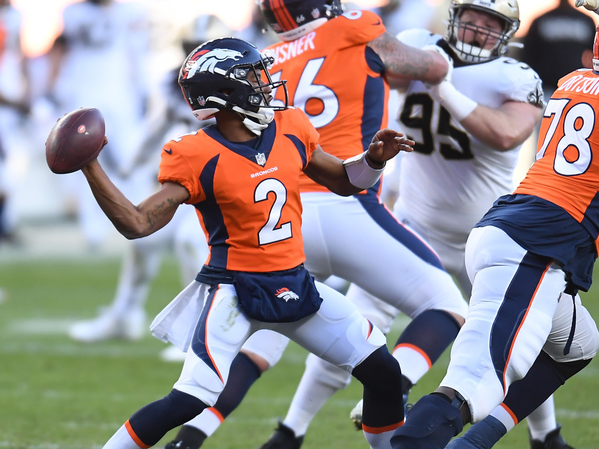 Denver Broncos quarterback Kendall Hinton (2) throws the ball against the New Orleans Saints in the second quarter at Empower Field at Mile High.