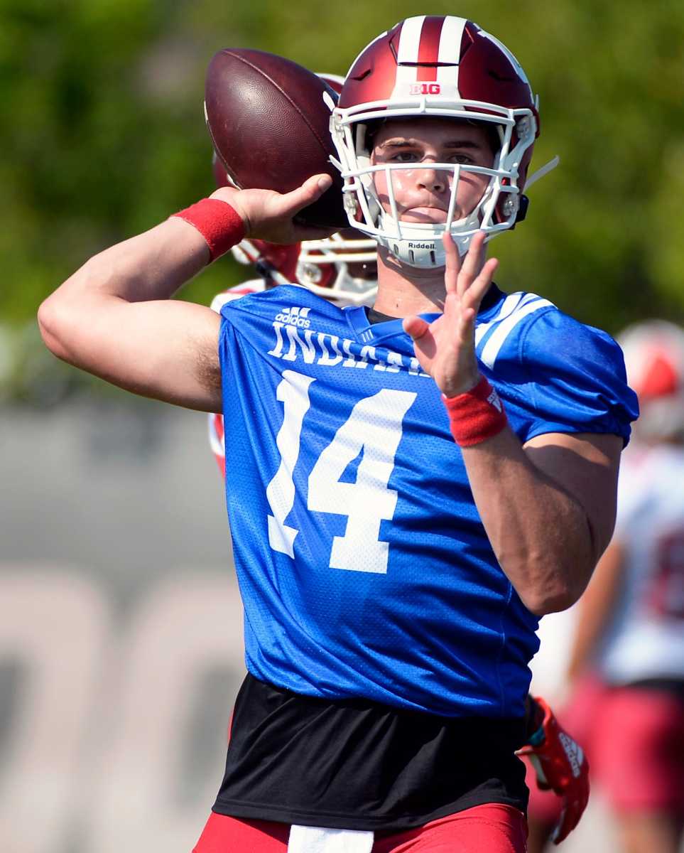 Indiana Hoosiers quarterback Jack Tuttle (14) throws a pass during the first day of fall camp at Mellencamp Pavilion in Bloomington, Ind., on Friday, August 2, 2019.