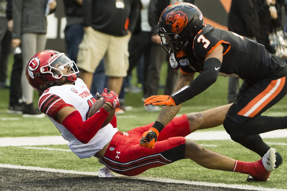 Oct 12, 2019; Corvallis, OR, USA; Utah Utes wide receiver Samson Nacua (45) catches a pass for a touchdown against Oregon State Beavers defensive back Jaydon Grant (3) during the first half at Reser Stadium.