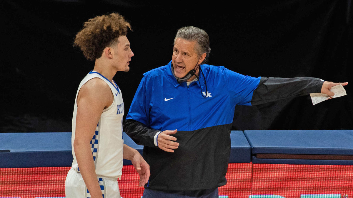 Kentucky coach John Calipari talks to Devin Askew during a loss to Kansas