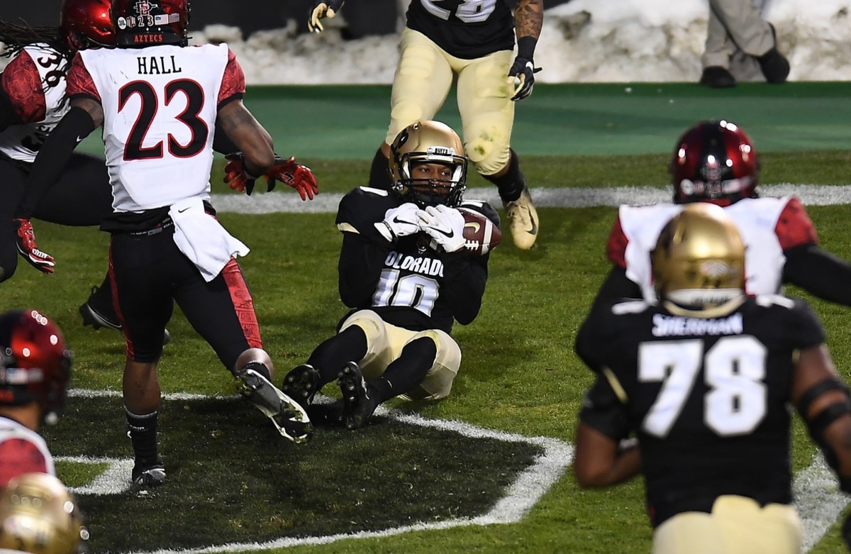 Nov 28, 2020; Boulder, Colorado, USA; Colorado Buffaloes wide receiver Jaylon Jackson (10) pulls in a touchdown reception in the second quarter against the San Diego State Aztecs at Folsom Field.