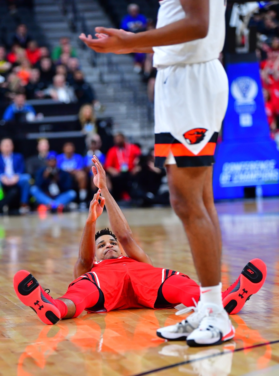 Mar 11, 2020; Las Vegas, Nevada, USA; Utah Utes guard Alfonso Plummer (25) gestures after being fouled on a 3-point shooting attempt during the first half against the Oregon State Beavers at Mobile Arena.