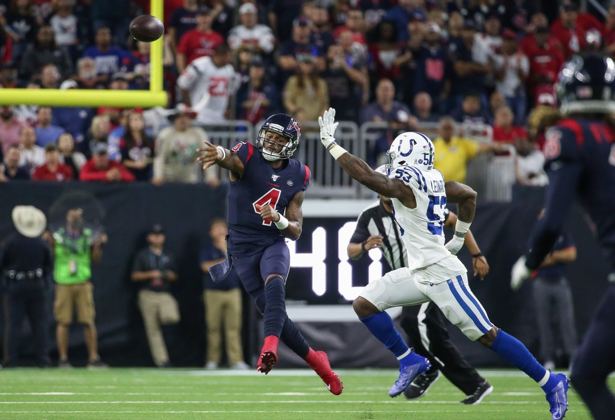 Houston Texans quarterback Deshaun Watson passes while getting pressure from Indianapolis Colts linebacker Darius Leonard in a 2019 game in Houston.
