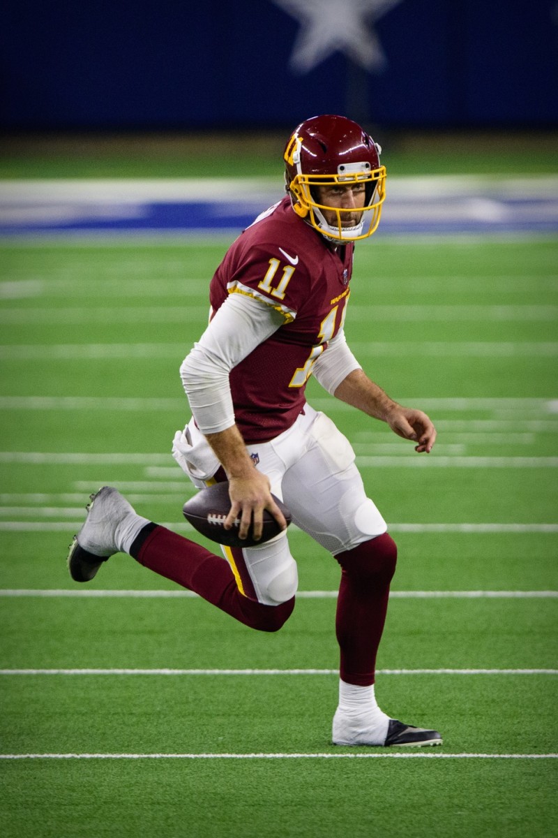 Nov 26, 2020; Arlington, Texas, USA; Washington Football Team quarterback Alex Smith (11) in action during the game between the Dallas Cowboys and the Washington Football Team at AT&T Stadium.