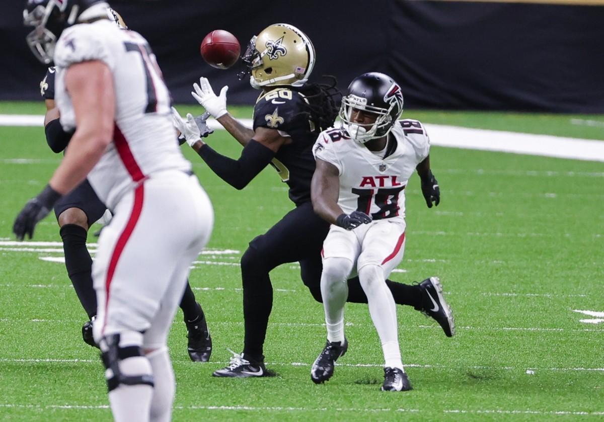 Nov 22, 2020; New Orleans, Louisiana, USA; New Orleans Saints cornerback Janoris Jenkins (20) intercepts a pass intended for Atlanta Falcons wide receiver Calvin Ridley (18) during the second half at the Mercedes-Benz Superdome. Mandatory Credit: Derick E. Hingle-USA TODAY Sports