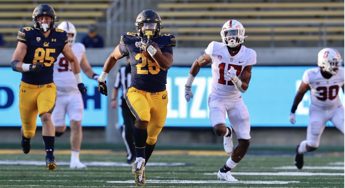 Damien Moore finds running room against Stanford in the Big Game.