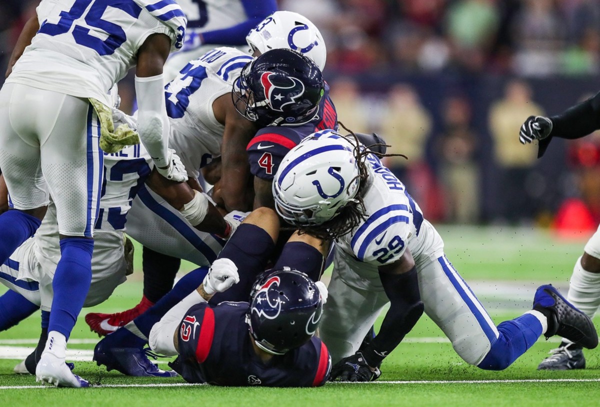 Houston Texans quarterback Deshaun Watson (4) is tackled by the Indianapolis Colts near the end of a 2019 game at NRG Stadium.
