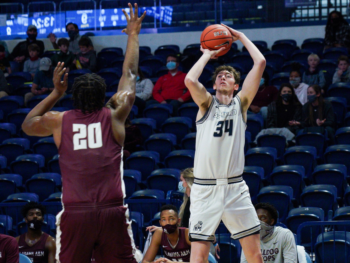 Samford center Jacob Tryon shoots during a game