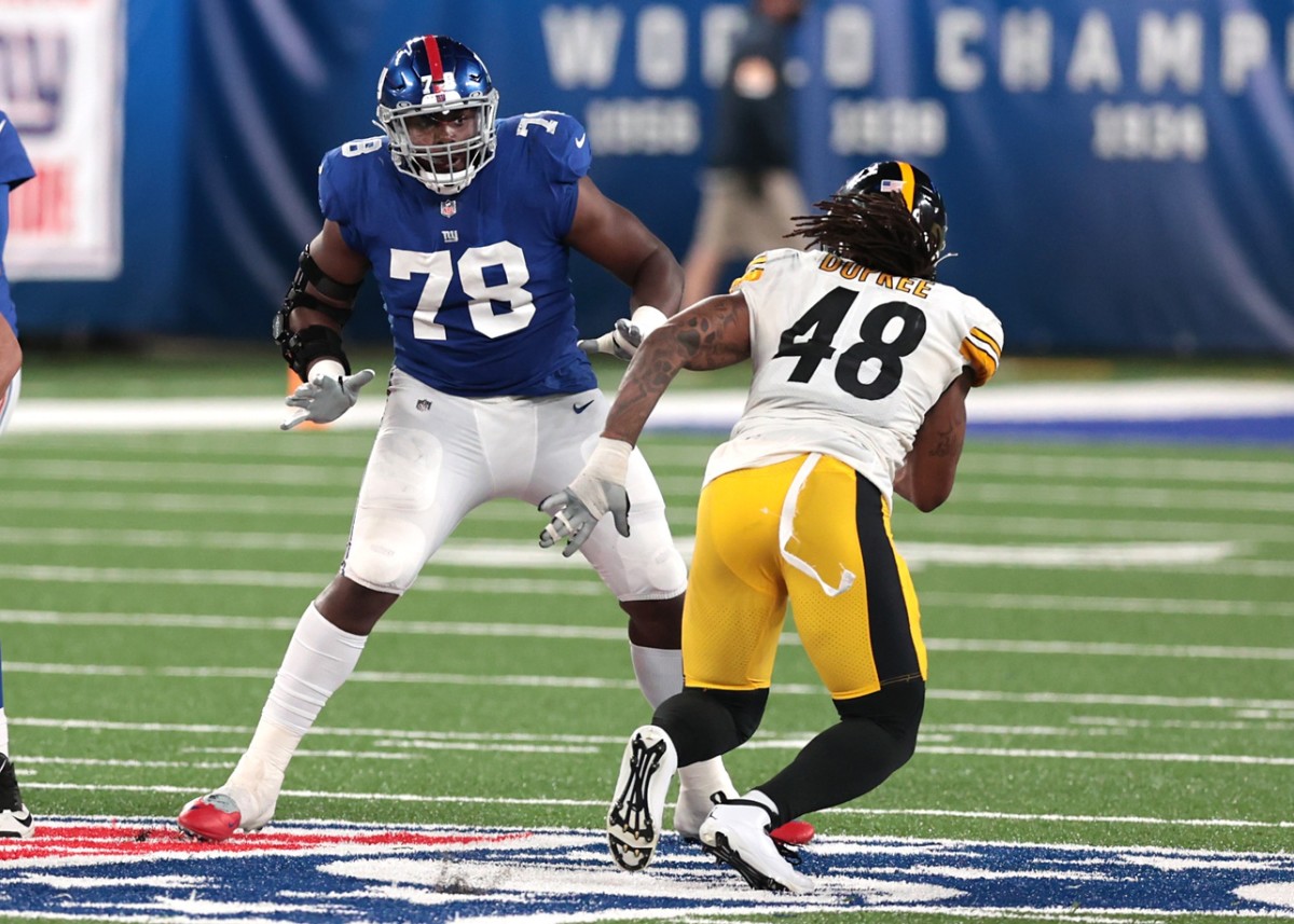 Sep 14, 2020; East Rutherford, New Jersey, USA; New York Giants offensive tackle Andrew Thomas (78) blocks Pittsburgh Steelers outside linebacker Bud Dupree (48) during the second half at MetLife Stadium.